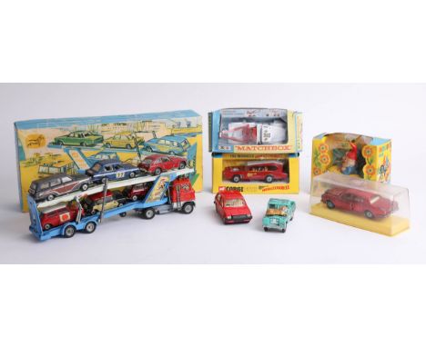 A collection of boxed and loose diecast model cars, including a boxed Corgi transporter 'Gift Set 41', a boxed 'Monkeemobile'