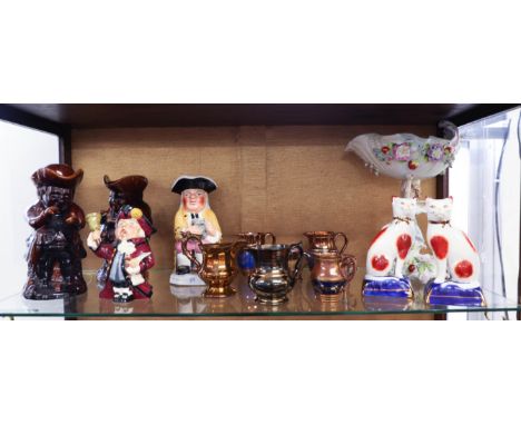 A quantity of ceramic jugs and figures including seven copper and lustre jugs and mugs, four various Toby jugs, pair of repli