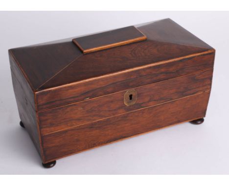 A Victorian mahogany tea caddy.