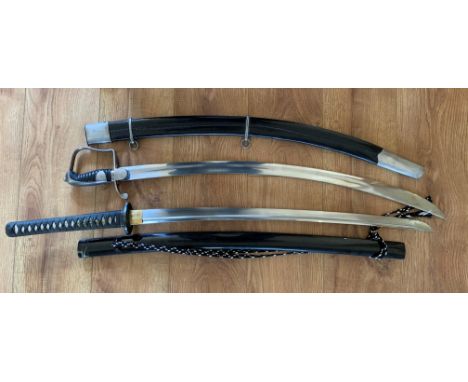 A Cold Steel Warrior Katana and a Cold Steel 1796 Light Cavalry Sabre, both used.