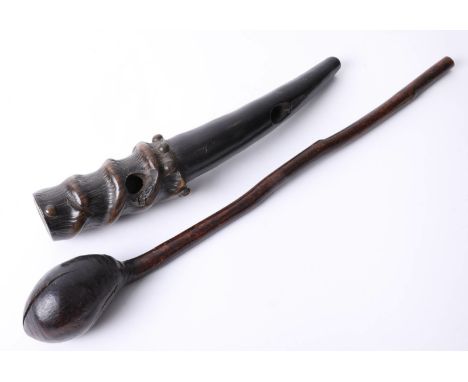 A carved African blowing horn together with Shillelagh stick. (2)