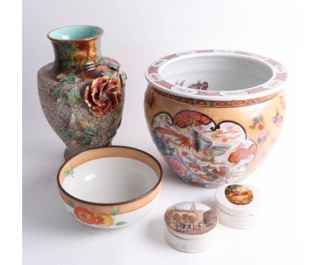 An interesting collection of china including a Clarice Cliff bowl.