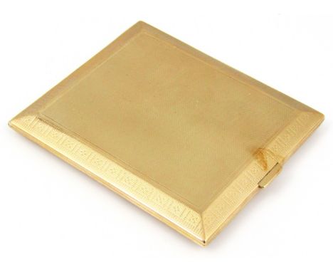 A 9ct gold cigarette case, engine turned decoration, 103g all in.