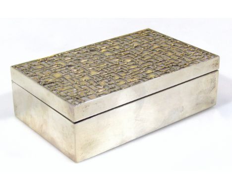 An Elizabeth II silver cigarette box, by Stuart Devlin, of rectangular outline, with elaborate gilt highlighted raised mosaic