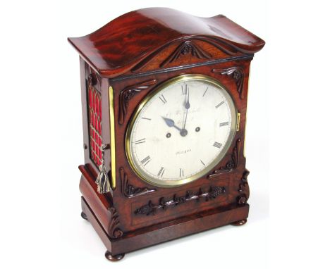 A Regency flame mahogany cased 8-day bracket clock, the double fuseé movement striking on the hour fronted by a silvered 19cm