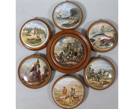 Various Prattware pot lids, to include Pegwell Bay, established 1760, 11cm dia. etc, in wooden mounts. (7)