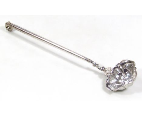 A William IV silver ladle, with elongated cannon scroll stem, inverted collar and shaped bowl, indistinct maker's mark, Londo