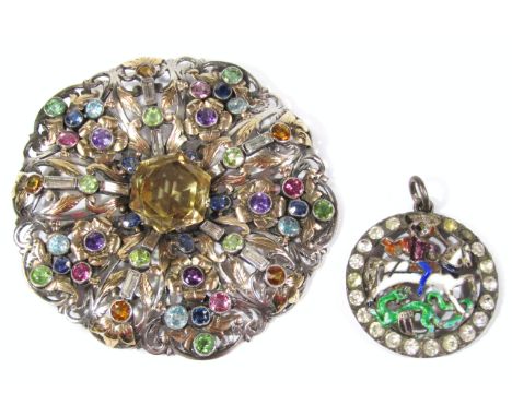 A paste set roundel brooch, set in cast white metal, 6cm dia., and a similar set enamel pendant of St George & The Dragon, 3c