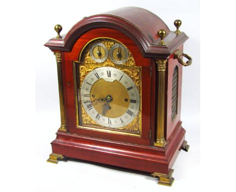 A late Victorian mahogany arched top fusee table clock, the Roman numeric and Arabic 17cm dia. chapter ring marked D and J We