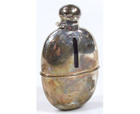 A Victorian silver and glass hip flask, by William Hutton &amp; Sons, the oval shouldered body with compressed circular lid, 