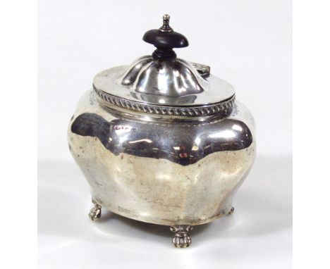 A Victorian silver tea caddy, by William Atkin, of bombe outline, with ebonised knop, oval lid and plain interior, raised on 