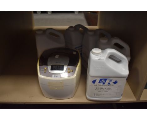 A James Products Digital Ultrasonic Cleaner together with five cartons of Watch Cleaning Solution