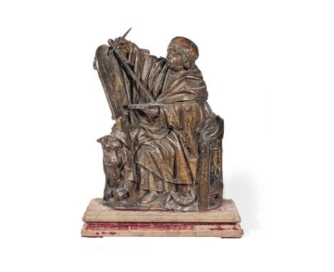 A good early 16th century beech carving of St. Luke Painting the Virgin, Flemish, circa 1500-1520St. Luke wearing a close-fit