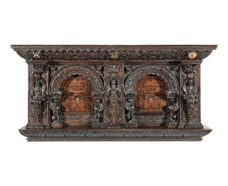 A good Elizabeth I joined oak and marqeutry-inlaid overmantle, circa 1570Having a chequer-inlaid cornice with leaf-carved lam