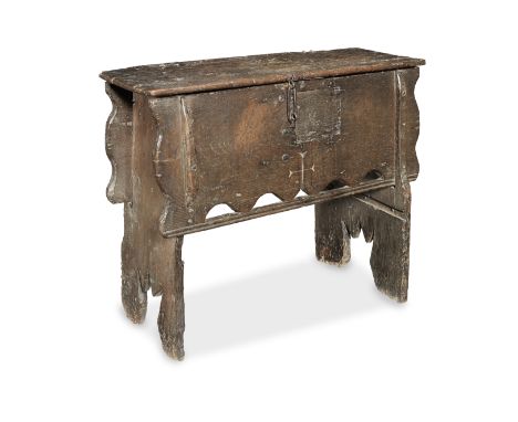 A rare and documented Henry VIII boarded oak box-stool, circa 1540Of classic mid-16th century five-board form, but also with 