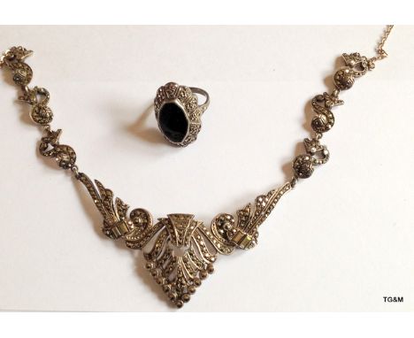 An Edwardian silver marquisette necklace and a silver marquisette black onyx ring