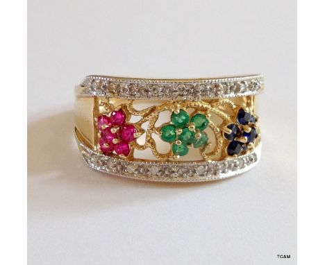 A 9ct gold hallmarked diamond and precious stone ring size R