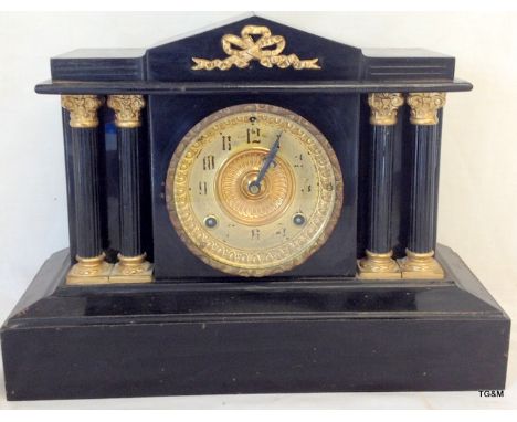 A late Victorian American cast metal and gilded mantle clock with column decoration