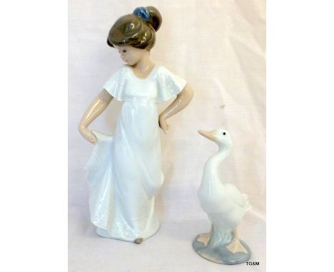 A Nao girl posing 23cm and a Lladro Goose 13cm