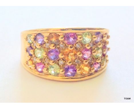 A 9ct gold diamond, citrine, Peridot, amethyst and pink tourmaline ring