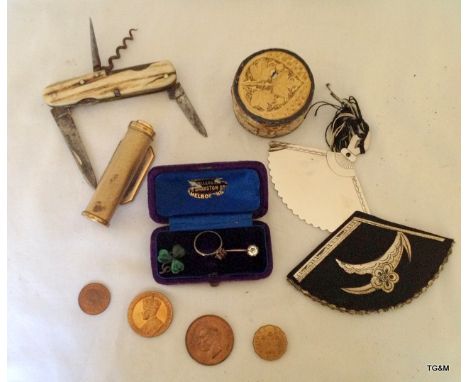 Assorted items to include, pen knife, stick pin, a fan and a pendant