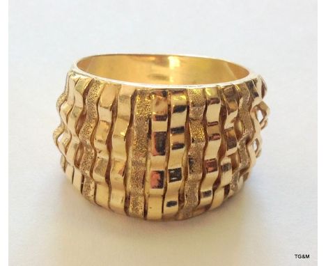 A 9ct gold bark weave ring