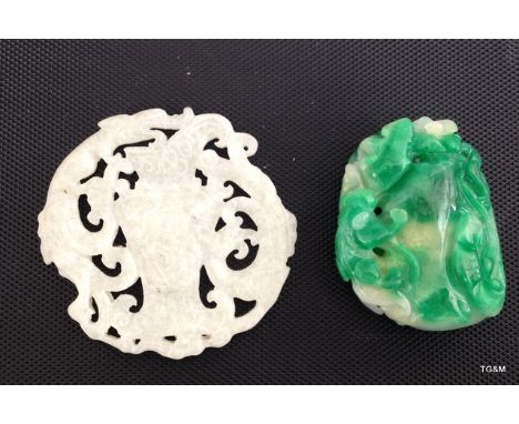 A Jade fish pendant and a white jade carved disc