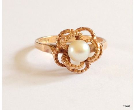 A 9ct gold hallmarked pearl set ring size L