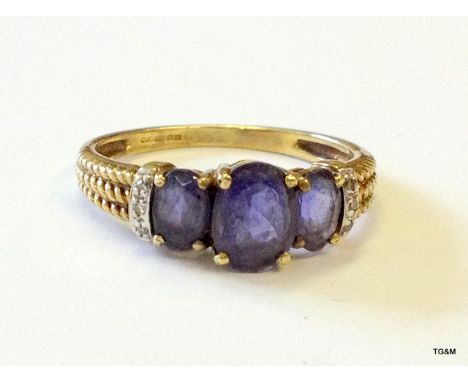 A 9ct gold Amethyst and diamond ring size T