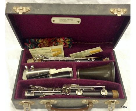 A Boosey and Hawkes Clarinet in original fitted case model 77