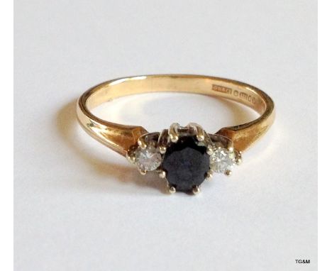 A 9ct gold hallmarked Sapphire and diamond ring size O