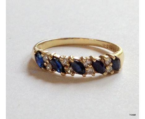 A 9ct gold hallmarked  sapphire and diamond 1/2 eternity ring size P