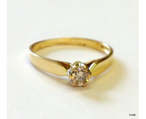 A 9ct gold hallmarked ladies 0.25ct diamond solitaire ring size N