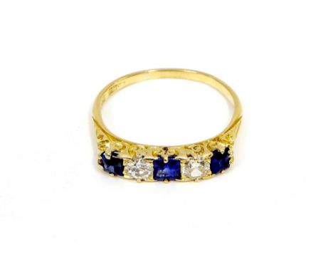 An 18ct gold diamond and sapphire 5 stone ring 0.5ct diamonds size P