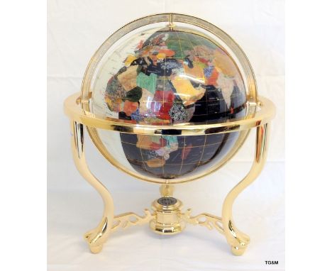 A semi precious stone inlaid celestial day and night globe on brass stand with inset compass 51 x 46