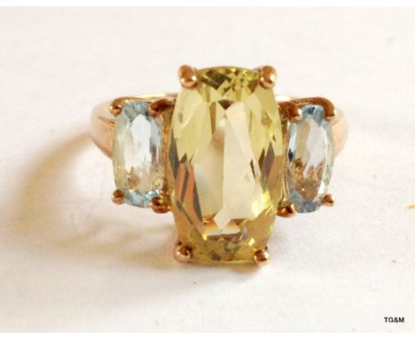 A 9ct gold hallmarked citrine and Aquamarine ring size P