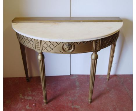 Giltwood demi-lune console table with later composition fixed marble top above lion mask and geometric decoration to the frie