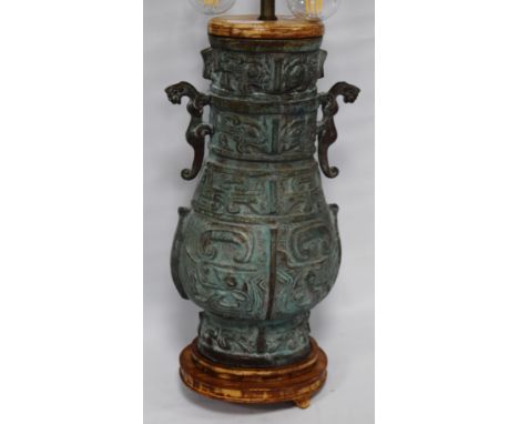 Oriental verdigris (green) cast vase/lamp (20th century) of archaic form, vase 37cm high, converted to electricity, on fixed 