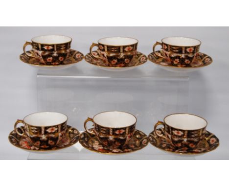 Royal Crown Derby Imari porcelain six-piece tea service comprising six cups and six matching saucers, cups 5cm high, saucers 