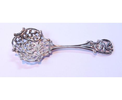 Silver caddy spoon with pierced bowl and stem, by Huttons, 1891. 