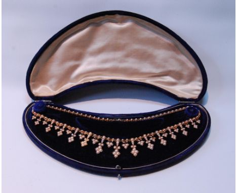 Victorian gold and pearl fringe necklet with spear-shaped drops, probably 15ct, 42cm, 30.4g gross, in fitted blue velvet case