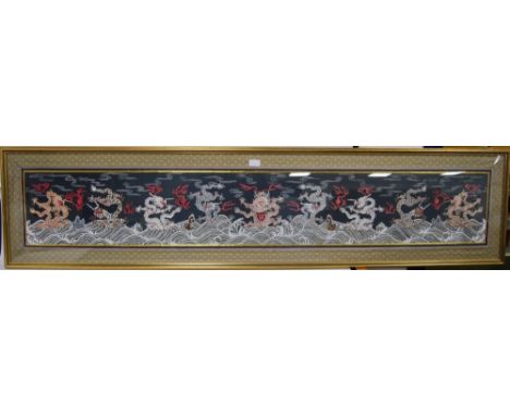 Oriental embroidered silk panel (last quarter of 20th century) depicting nine Korean traditional dragons chasing the flaming 