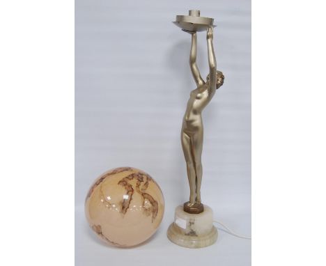 Art Deco painted table lamp, c. 1930s, modelled as a nude female holding aloft a later mottled spherical glass shade, on marb