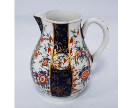 18th century first period Worcester Imari sparrow beak baluster cream jug, with all over Imari floral panels, blue square fre