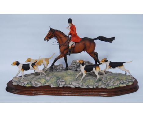 Border Fine Arts limited edition hunting group by David Geenty modelled as a huntsman on horseback with four hounds, no. 185 