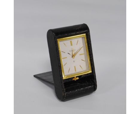 Jaeger-LeCoultre timepiece/travel clock with silvered signed dial and gilt baton markers, 11cm high, stamped with serial numb