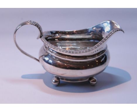 Silver milk jug of boat shape, by John Walton, Newcastle 1823, 159g or 5oz. 