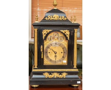 A good Victorian table or boardroom clock with cartouche. Examined by J.W. Benson London on dial. A three-train chain driven 