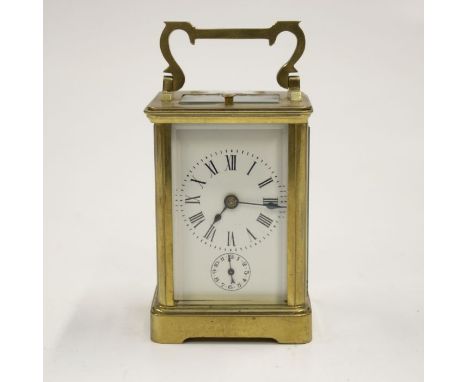 A French small repeating carriage clock mid 20th century, two train sprung movement with balance escapement chimney on a gong