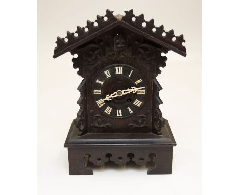 A good late Victorian Black Forest Cuckoo mantel clock with two train skeletonised movement. striking on a gong. Dial 5 1/2 "